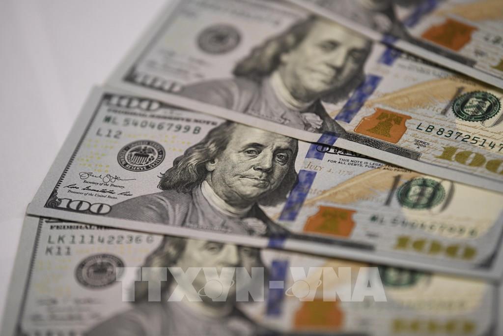 Đồng USD tại ngân hàng ở Washington DC. Ảnh: THX/TTXVN
