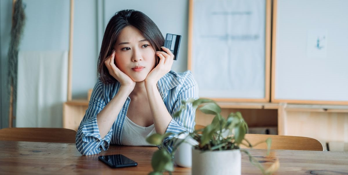 young-asian-woman-having-problems-with-her-credit-royalty-free-image-16734701131-5287.jpg