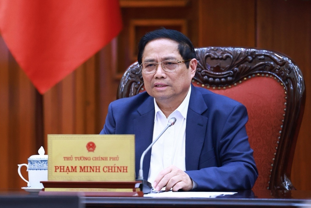 Thủ tướng Phạm Minh Chính chủ trì cuộc họp về chính sách tiền tệ, chính sách tài khóa chiều 16/5. Ảnh VGP
