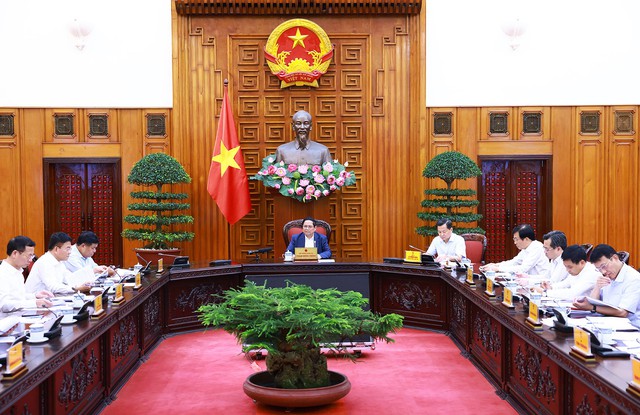 Thủ tướng Phạm Minh Chính chủ trì cuộc họp về về chính sách tài khóa, chính sách tiền tệ, thị trường vàng, tỷ giá, lãi suất và huy động vốn cho đầu tư phát triển - Ảnh: VGP.