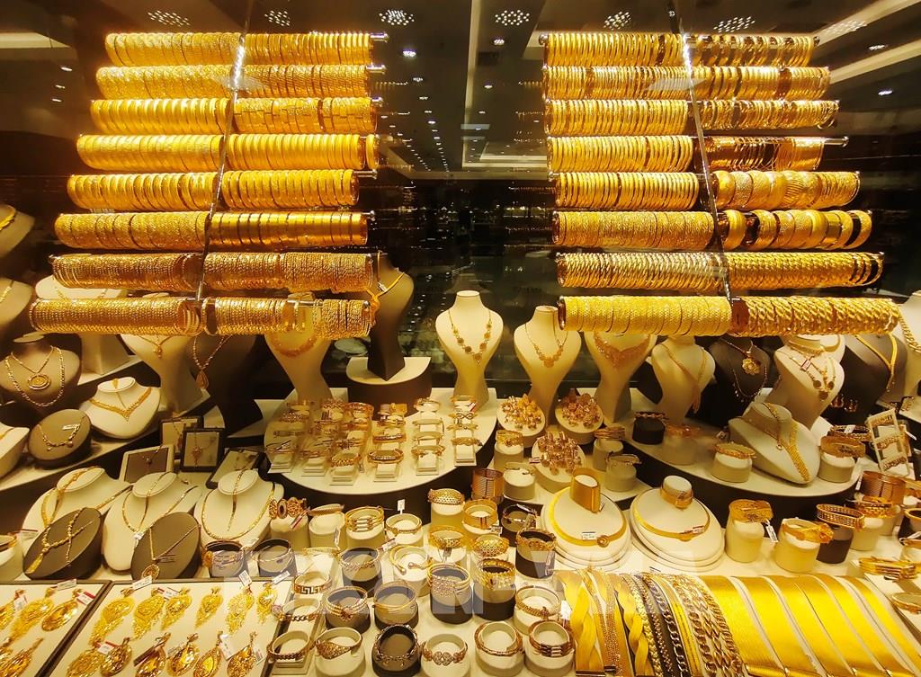 110040-chi-so-dow-jones-lap-dinh-moi-gia-vang-cham-muc-cao-nhat-lich-su.jpg