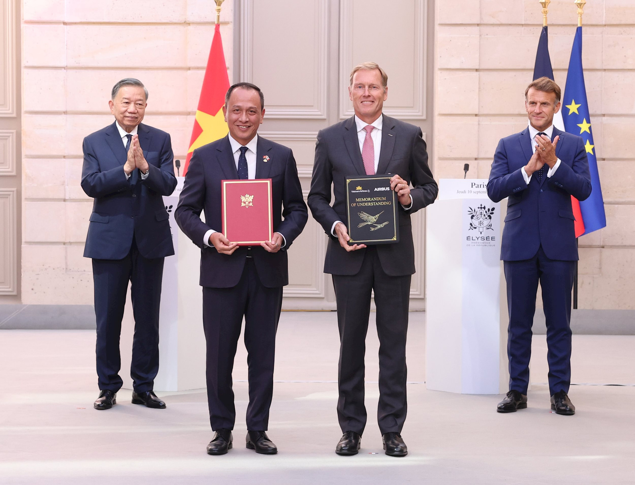 1.-vietnam-airlines-va-airbus-trao-bien-ban-ghi-nho-ve-viec-chao-ban-5-may-bay-a350-duoi-su-chung-kien-cua-tong-bi-thu-chu-tich-nuoc-to-lam-va-tong-thong-phap-emmanuel-macron.jpg?md5=PrbpxUPJMO8r0D6P8J7Bsw&expires=1789103473