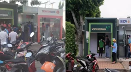 Vì sao người rút tiền mặt Tết năm nay ít hơn hẳn mọi năm?