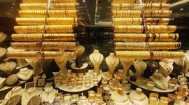 Thị trường vàng chịu áp lực từ đồng USD và lập trường của Fed