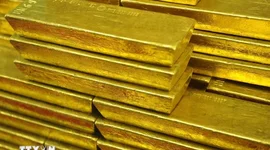 Giá vàng giảm trước sức ép từ USD và trái phiếu