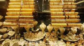 Vàng mất mốc 5.000 USD/ounce trong phiên giao dịch trầm lắng