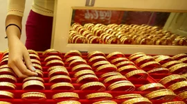 Giá vàng thế giới giảm nhẹ do số liệu lạm phát Mỹ thấp hơn dự kiến