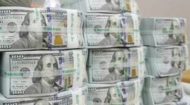 Đồng USD hướng tới tuần tăng mạnh nhất trong hơn một năm