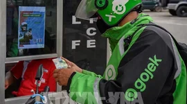 Chính sách 8% và thu nhập thực tế của tài xế công nghệ tại Indonesia