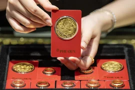 Giá vàng lùi bước trước kỳ vọng Fed tăng lãi suất trở lại