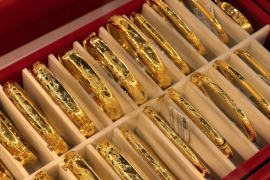 Vàng lập mốc 5.000 USD sau phán quyết thuế quan của Mỹ