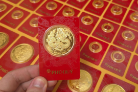 Giá vàng giảm 1,4 triệu đồng/lượng, tỷ giá USD "đứng im" phiên đầu tuần