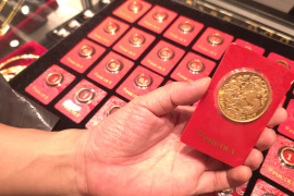 Giá vàng trước cơ hội tăng trở lại mốc 5.000 USD/ounce