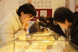 Giá vàng giảm sâu sau khi Fed giữ nguyên lãi suất