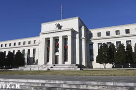 Fed dự kiến giữ nguyên lãi suất trong năm 2026 dựa trên phân tích Natixis
