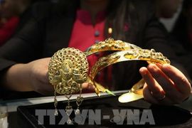 Giá vàng nhích nhẹ khi thị trường chờ phát biểu của Chủ tịch Fed