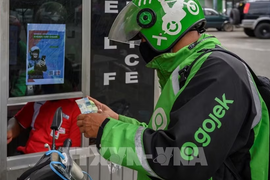 Chính sách 8% và thu nhập thực tế của tài xế công nghệ tại Indonesia