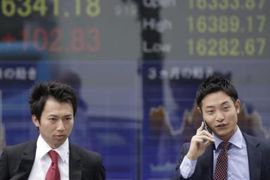Chứng khoán châu Á phân hóa trước thềm hội nghị thượng đỉnh Mỹ-Trung