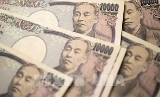 Đồng yen và chứng khoán tiếp tục phản ứng sau khi BoJ tăng lãi suất