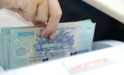 NIM giảm, lợi nhuận ngân hàng vẫn có thể tăng 15,3% trong năm nay