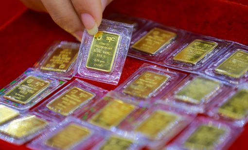 Giá vàng và USD cùng giảm