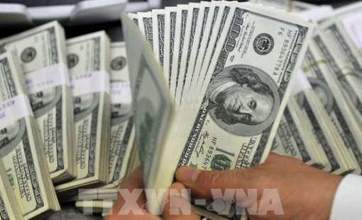 Đồng USD chịu sức ép do nguy cơ thương chiến Mỹ-Trung leo thang