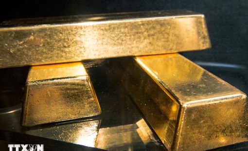 Giá vàng hạ nhiệt khi đồng USD mạnh lên và nhà đầu tư chốt lời