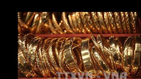 Giá vàng thế giới chạm mức cao nhất trong gần ba tuần