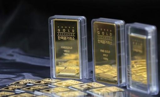 Đồng USD xuống giá tạo lực đẩy cho giá vàng châu Á