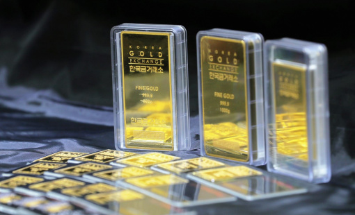 Giá vàng thế giới dứt đà tăng