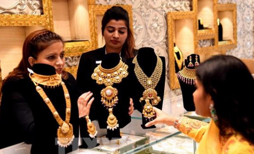 Căng thẳng thương mại dịu bớt, giá vàng đi xuống