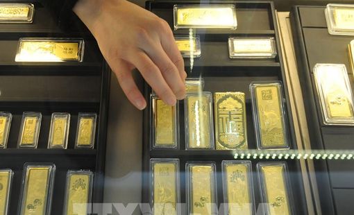 Giá vàng thế giới giảm khi đồng USD mạnh lên