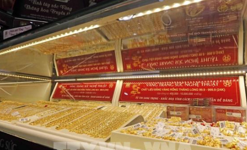 Đồng USD giảm tạo đà cho giá vàng đi lên