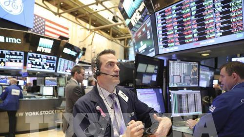 Phố Wall biến động trái chiều khi bước vào tuần cao điểm mùa báo cáo lợi nhuận