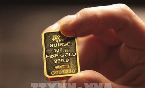Đồng USD bật tăng, giá vàng quay đầu giảm