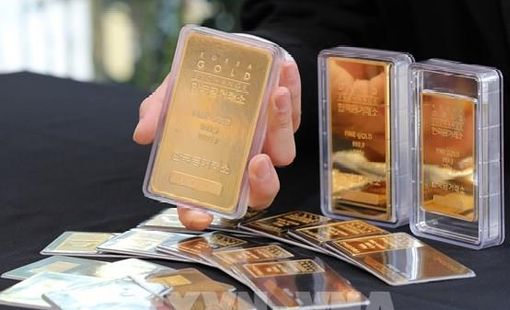 Đồng USD mạnh lên đẩy giá vàng thế giới đi xuống