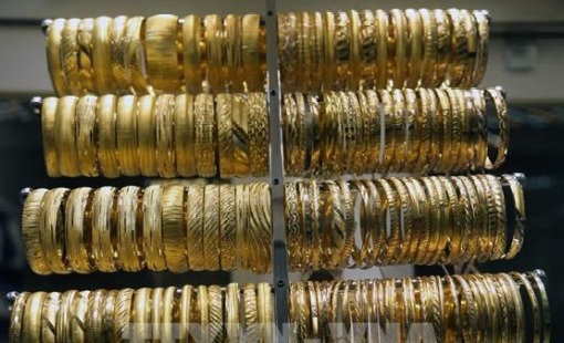 Giá vàng giằng co giữa kỳ vọng hạ lãi suất và sức mạnh đồng USD