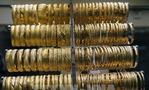 Giá vàng giằng co giữa kỳ vọng hạ lãi suất và sức mạnh đồng USD
