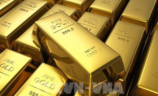 Giá vàng nối dài đà giảm tại châu Á sau thông điệp của Fed về lộ trình lãi suất