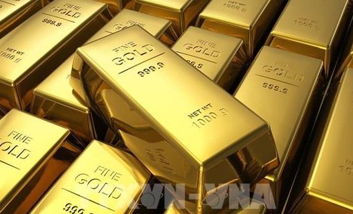 Giá vàng nối dài đà giảm tại châu Á sau thông điệp của Fed về lộ trình lãi suất