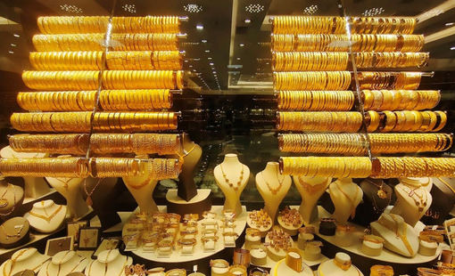 Giá vàng châu Á giảm cuối tuần do đồng USD tăng mạnh