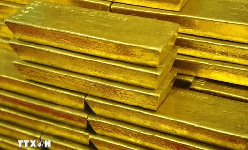 Giá vàng giảm trước sức ép từ USD và trái phiếu