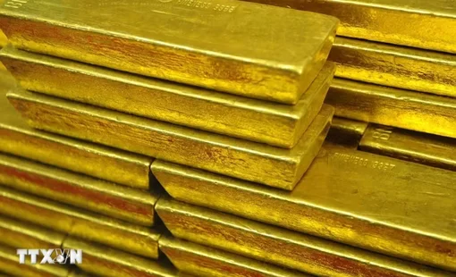 Giá vàng giảm trước sức ép từ USD và trái phiếu
