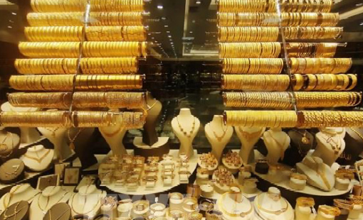 Vàng mất mốc 5.000 USD/ounce trong phiên giao dịch trầm lắng