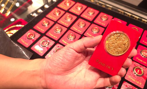 Giá vàng trước cơ hội tăng trở lại mốc 5.000 USD/ounce