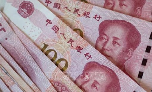 Các định chế tài chính toàn cầu nâng dự báo về đồng NDT
