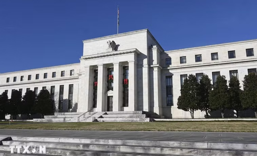 Fed dự kiến giữ nguyên lãi suất trong năm 2026 dựa trên phân tích Natixis