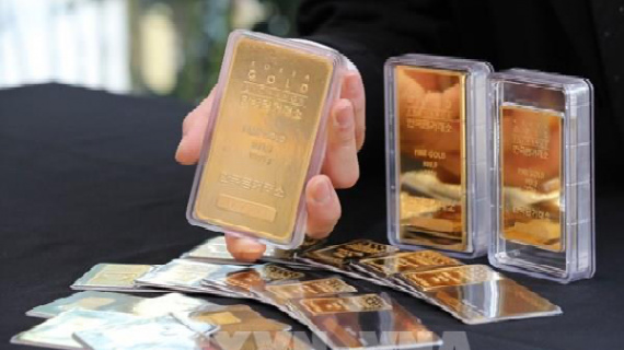 Giá vàng mất ngưỡng 3.000 USD/ounce do tình trạng bán tháo chốt lời