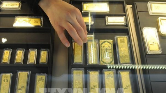 Giá vàng thế giới phiên 21/7 cao nhất trong 5 tuần