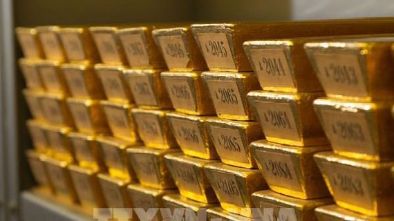 Nhu cầu trú ẩn an toàn giảm, giá vàng thế giới mất đà